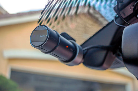 Blackvue Dash Camera mounted on a car windshield